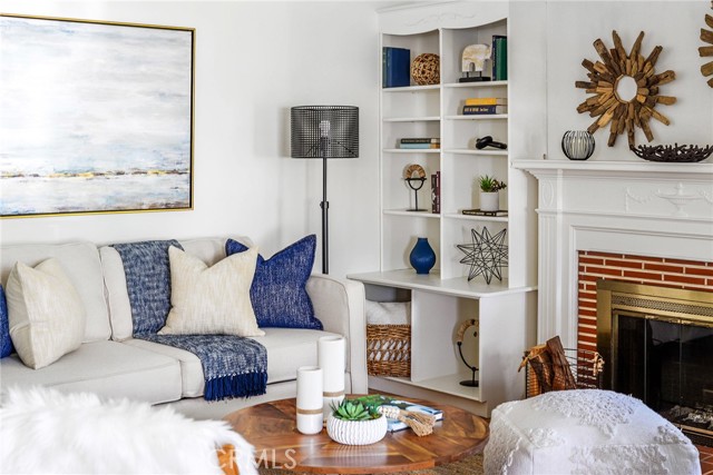 Real fireplace in the great room. Built in bookshelves!