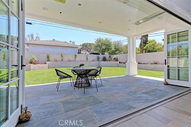 Backyard patio with recessed ceiling heaters