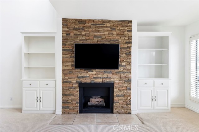 Cozy Fireplace, and Custom Cabinets