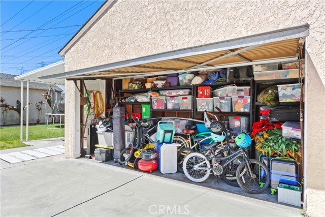 2 car garage - other half of garage with organized storage.