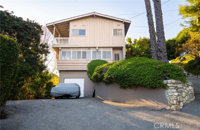 Attached 1-car garage on lower level with 2 side-by-side parking spaces