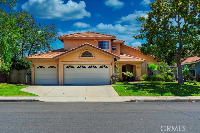 14157 Coloma Street Fontana, California Welcome home to this Impressive Professional designed Feng Shui home in the sought after community of "The Village of Heritage" in Fontana. Enter the home into an impressive a formal living room and dining room with gorgeous crystal chandeliers, large circular staircase and vaulted ceilings. The open kitchen features granite countertops, an electric stove with gas plumbing option, large counters including a breakfast bar, and dining nook. The spacious and bright family room offers an inviting fireplace and sliding glass doors to the stunning private backyard that includes fruit trees, and a built in pool and spa. The master bedroom offers his and her walk in closets, dual sinks with vanity in the master bath, along with a soaking tub, and walk in shower. This house has 5 spacious bedrooms including 1 full bed and bath downstairs perfect for a home office, mirrored closet doors throughout, tons of linen space, and new vinyl in both upstairs bathrooms. Additional property highlights include a full size laundry room complete with utility sink and cabinets and a 3 car garage. Convenient to area schools, shopping, restaurants, and major freeways.