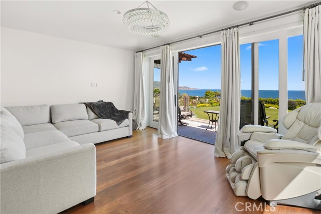 Primary Bedroom with Indoor and Outdoor Sitting Areas. Primary Bedroom with Indoor and Outdoor Sitting Areas.