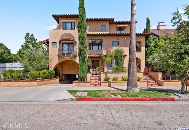 108 S El Molino Avenue 105 Pasadena, California Elegant Mediterranean Villa-style townhouse is located in the prestigious Historical Playhouse District in Pasadena. This charming building features lovely archways, elegant courtyards, romantic balconies, and sculpted wrought iron details. Built in 2004, a two-story luxury condominium is designed to enjoy southern California living at its fullest featuring functional floor plan with living areas on the first level and two bedrooms upstairs. Living room with high ceilings, travertine fireplace, recessed lighting, and wood floors. Gourmet kitchen features granite counters, custom wood cabinetry, and stainless appliances. The generous formal dining room opens to a spacious private patio with Spanish tile and lovely trees accessible through the kitchen dining area. There is an additional powder room downstairs. European baths feature travertine showers and flooring, marble counters, and double sink. Two spacious master suites feature high ceilings and generous closets. There is an enormous balcony with a built-in cabana to enjoy views of Pasadena. Located in the sizzling hot Playhouse district of Pasadena, this unit is moments away from Old town Pasadena, El Paseo.