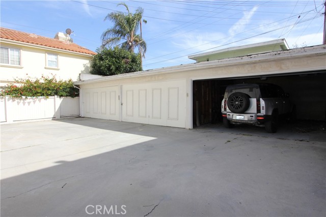 3 double garages.
7 enclosed places. Roll up garage door on the right.