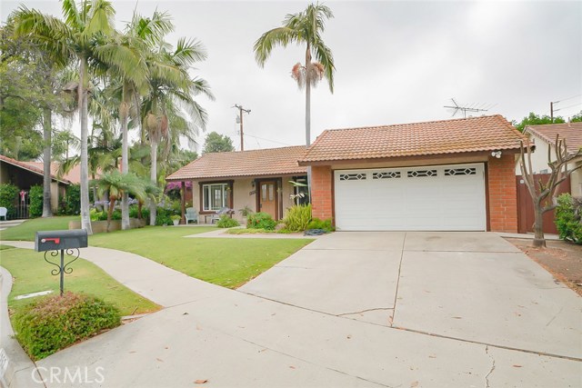 4252 Trix Circle Yorba Linda, California DETACHED SINGLE STORY HOME LOCATED IN A CUL-DE-SAC STREET! This single floor home includes 3 bedroom and 2 baths, with a generous size yard in the back. There is a living room and a separate family room with a fireplace, perfect to cozy up to on those cold nights. The living room is open and includes separate access to the side yard. While the kitchen and family room are connected, with the family room having access to the rear patio area, which is perfect when entertaining guests. The kitchen offers tiled floors, built-in microwave, dishwasher, and plenty of cabinets with storage space. Windows throughout invite natural light in. The main bedroom offers it's own bathroom inside. Separate laundry closet inside the home for side-by-side washer and dryer units. Direct access 2-car garage with extra parking on the driveway. The rear yard is open, with a separate low maintenance patio area, which is perfect when hanging out and entertaining family or friends. Conveniently located near restaurants, retail, Brea mall, schools and easy access to the 57 freeway.