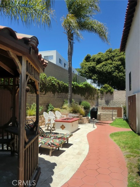 Back Yard with Gazebo, Fire Table & Grill