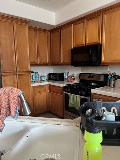 Open kitchen w/ ample counter space and cabinets.