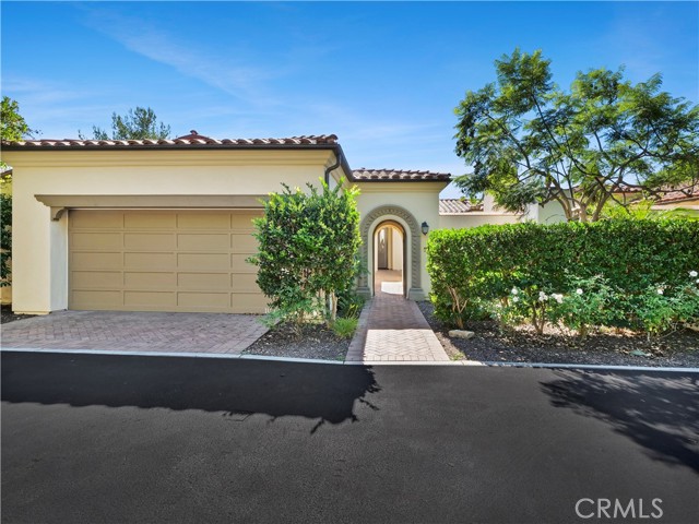 Gated private entrance with 2 car garage