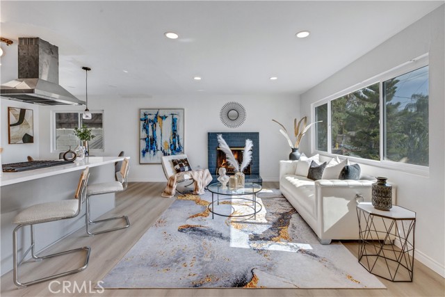 Living Room w/ Fireplace / Recessed Lights.