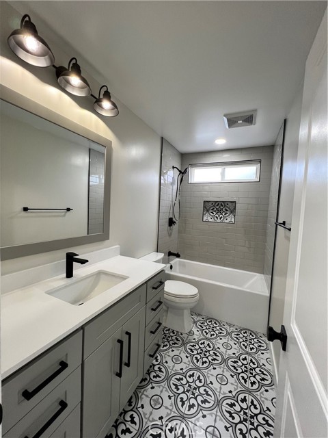 Downstairs bath, designer tile selections, custom vanity