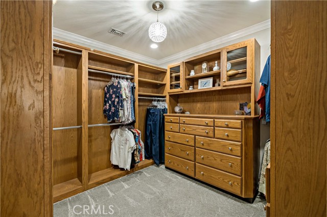 huge walk in closet with built in organizers