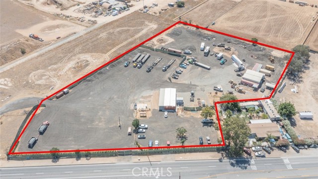 Great Opportunity to Develop approximately 5 Acres of Prime INDUSTRIAL REAL ESTATE in Southern California!!! This is an Excellent location with easy access to 15 Freeway and located right at the corner Bundy Canyon Rd and Mission Trail. This property is zoned MANUFACTURING - SERVICE COMMERCIAL (M-SC) and allows for a myriad of Industrial and Manufacturing uses such as: WAREHOUSING & DISTRIBUTION, Contractor Storage Yard, Vehicle Repair, Carwash/Truckwash, Truck Sales/Rental and many more!. Some operations allowed with a Conditional Use Permit (CUP) include: Recycling, Cannabis Businesses, and TRUCKING OPERATIONS. Property includes a 2400 sq. ft. office trailer that can be used to set up operations right away with your development team. AMAZON currently in the process of developing approximately +/- 1,255,000 SF Distribution Center on 300 acres just around the corner. Great opportunity to Invest in the Path of Progress.  Buyer and Buyer's agent to conduct all investigations to satisfy themselves.