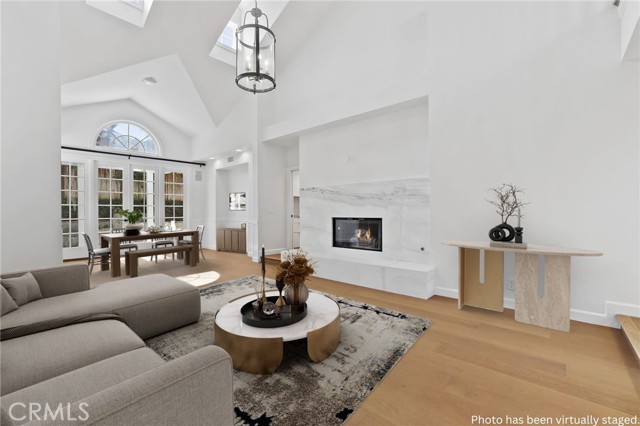 Living room / dining room. Photo has been virtually staged.