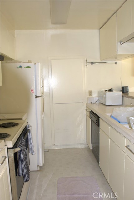 Kitchen with nice pass through to living room.