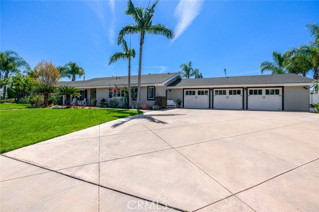 Three car garage and driveway parking