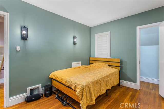 Downstairs bedroom w/ 1/2 bath