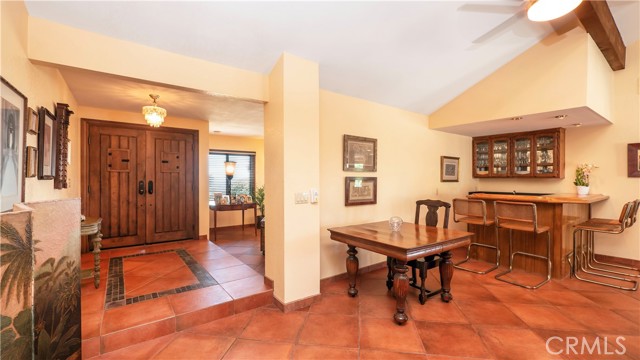 Family room wet bar with view to front door