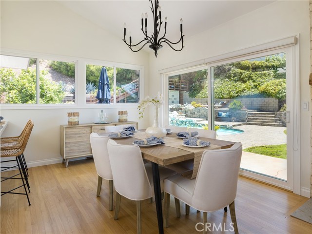 Fabulous view of huge yard and pool from dining area.