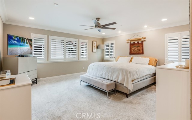 Huge master suite with great light, plantation shutters and more