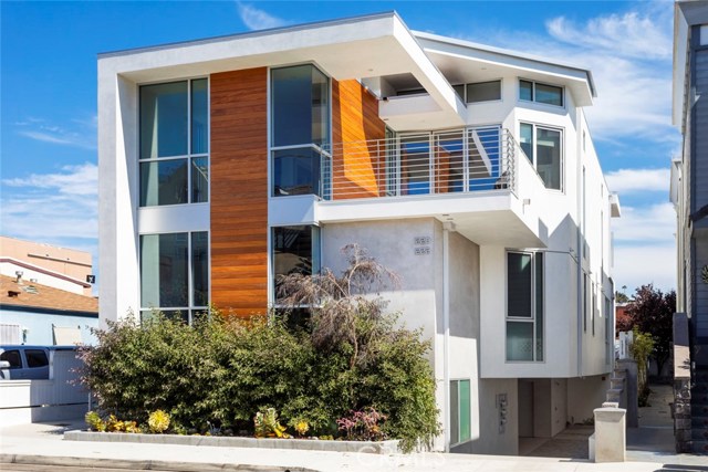 1220 Cypress Avenue Hermosa Beach, California Modern Luxury in the heart of downtown Hermosa Beach awaits you. Park the car and walk to everything you can imagine (Beach, Restaurants, Shops, Award Winning Hermosa Schools, Park, Jogging Trail and more). This 2015 built, 3 bedroom Modern Beach home is very rare for the area offering: 2500 square feet of living space (btv), 15 foot high ceilings in main living area with open concept kitchen including Thermador stainless steel appliances, designer light fixtures, roof deck, 3 stop Elevator and Air Conditioning. Built by high end home builder KKC Fine homes and designed by Peha Architecture this like new home is in a class of its own. List of features includes: spacious island kitchen, Caesar Stone Counters, open dining area, and huge living area with Marble Fireplace. The open floor living extends through the folding Nano glass doors to a large outdoor living space. The Master suite is complete with large walk in closet, dual sink vanity, free standing soaking tub, and separate shower. Huge windows throughout offer maximum sunlight and the white oak flooring gives this home it's clean lines. Large roof deck with 360 degree views and attached 2 car garage make this the ultimate Beach House. A true gem in the heart of the best little beach town in California!