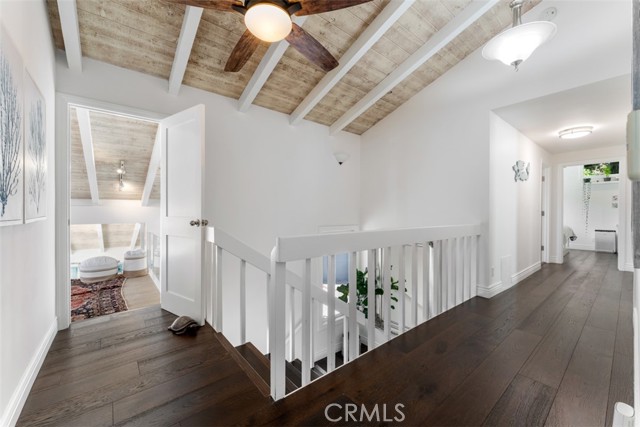 Rich wood floors throughout the upstairs