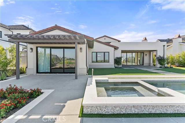 Lovely backyard with pool and spa.