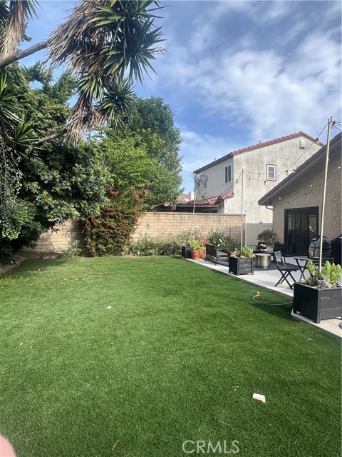yard with synthetic grass now