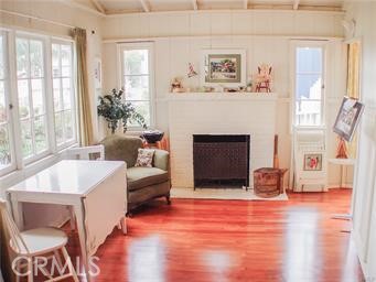 Two cozy cottages with high pitched beamed ceilings, wood floors, amazing natural light and coastal ocean breezes!