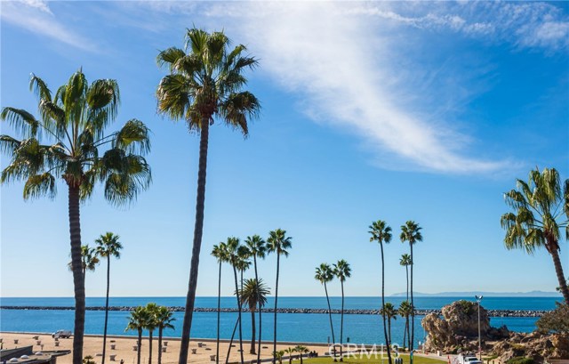 2901 Ocean Boulevard Corona del Mar, California Stunning ocean and sunset views from this exclusive 3 bedroom plus fully loaded guest casita, 4.5 bath, oceanfront residence. With an open floor plan highlighted by dramatic floor to ceiling windows, every room has a backdrop of breathtaking ocean and/or harbor views. Private patios on each level embody California coastal living at its finest. With beautifully warm, inviting interiors and custom touches throughout, interior highlights include: a large chef's kitchen with custom cabinets, granite countertops and Wolf/Miele/Sub-Zero, state-of-the-art appliances; and, living areas with custom fireplaces and balustrades. Three grand en-suite bedrooms include the well-appointed master retreat with separate sitting room and luxurious bathroom with jet bath, steam shower, infrared sauna and walk-in closet. Additional highlights include a gated driveway with garage parking for 2 and off-street parking for 4 additional cars – a rarity in a beach front home. Live the ultimate Corona del Mar Lifestyle with awe-inspiring sunset views, direct beach access, and proximity to world-class shopping, dining, trails and beaches.