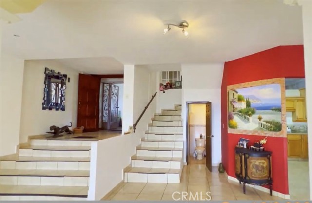 entry way and guest bathroom