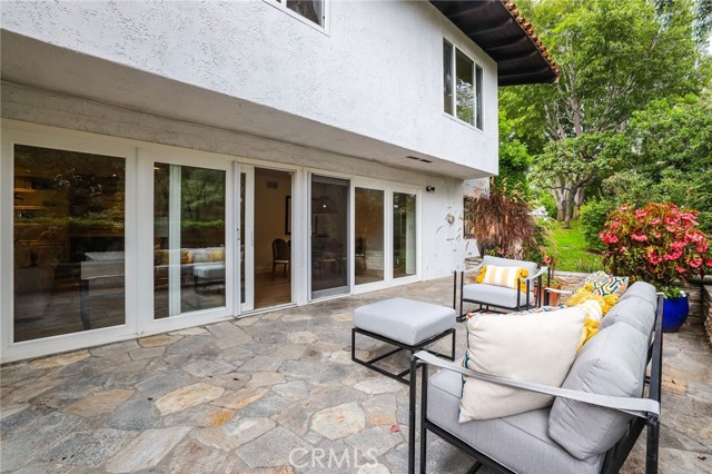Wrap-around back patio, offering a side view of the Back Bay.