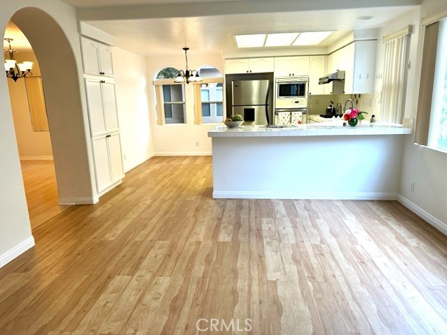 Open layout invites gatherings and entertaining.