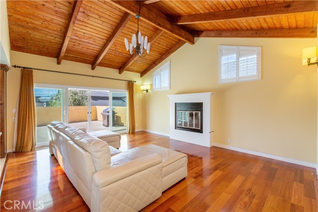 Family Room w/Fireplace and access to outside deck