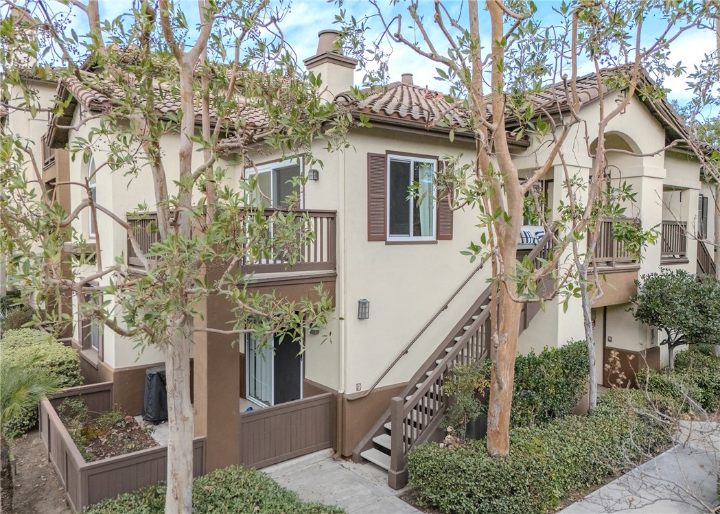 Welcome home to the luxury condominium located in the community of Rancho Vera Cruz, in Tustin.   
This upper corner condo faces the serenity of the pool area and amazing views of the golf course. Walking up to the condominium you will find a manicured green belt, the pool area and magnificent view of the golf course.  As you enter the property you will find the living room featuring custom paint, dual pane windows, recessed lighting and a cozy fireplace. The living room flows nicely into the dining area leading into the custom kitchen. The gourmet kitchen features large cabinets, a built-in sink, a pantry and quartz countertops- breakfast nook counter. Inside laundry room with built-in cabinets. This unit features 2 master suites with walk in closets, tile shower and quartz countertops.  Step outside the patio area facing the pool and spa, enjoy the greenery making this home perfect for relaxing. Property is an upper level corner unit with  complete privacy. Park inside the manicured 2 car garage, with built-in cabinetry and epoxy flooring. Too many other amenities to add, this is a must see home!