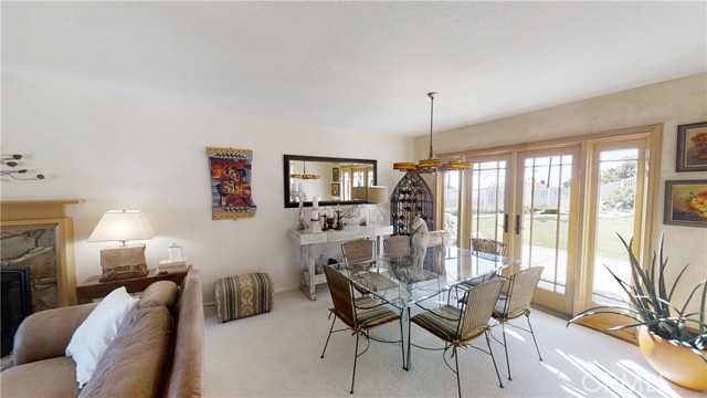 Living room French doors and dining area.