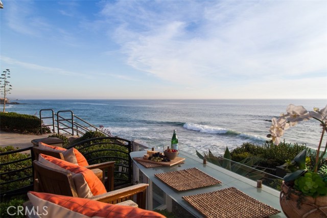 150 CRESS Street Laguna Beach, California This gated Laguna Beach residential compound, “Laguna Vista,” is perhaps the most attractive and versatile multi-unit property currently available in the Orange County real estate market. Nestled on an approximately 7,200 sq. ft. lot immediately adjacent to the Cress Street Beach steps, and with parking for at least 6 vehicles, it is a rare and incredible value and shines as a possible family complex, multiple lucrative beach rentals, or both. Its 3 lovely single-level villas offer a total of 8 bedrooms, 5 full baths plus a half-bath. The compound rests a short walk or ride from restaurants and shopping in one of the area’s trendiest neighborhoods. Completely renovated and incorporating the finest materials and fixtures, each of the homes is worthy of the most discriminating guests or family members. Wide-plank wood and tasteful tile floors, recessed lighting, crown molding and tray ceilings, high-end stainless kitchen appliances, and luxurious bathrooms are only a few of the features contributing to the ambiance of casual sophistication. An expansive, multi-level central courtyard features 4 fire pits and seating, with views of the ocean and spectacular sunsets. The investment and use options of this one-of-a-kind compound make it a superb prospect for immediate as well as long-term financial and tax benefits while creating a versatile opportunity for fiscal and personal gratification. Rare Laguna Beach short term rental license.