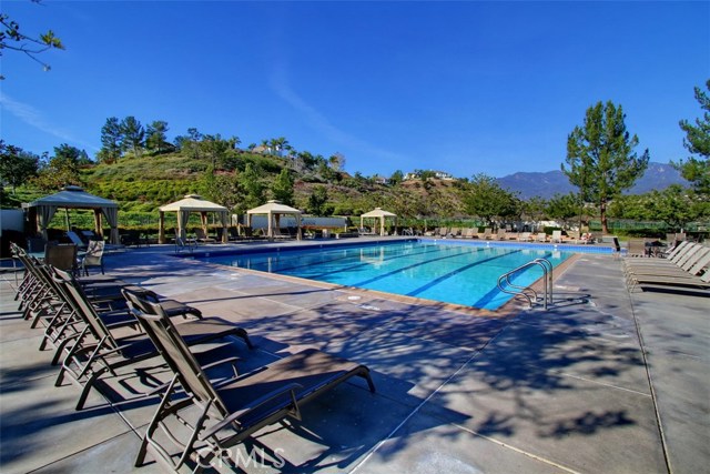 Views of the mountains and reservoir while lounging at the Dove canyon pool and spa.