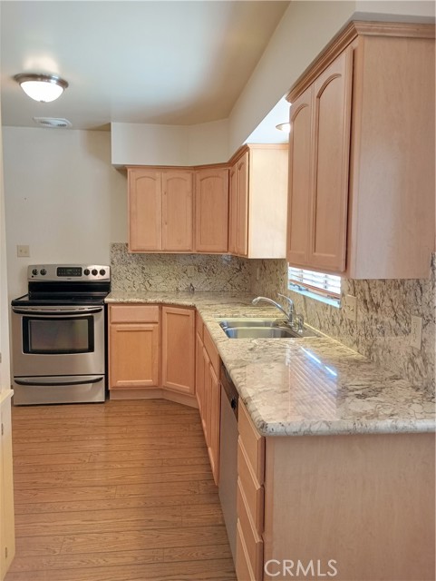 Gorgeous granite counter tops and newer custom made maple cabinetries