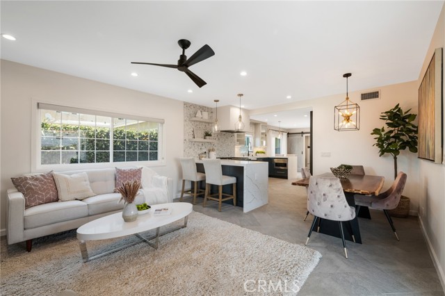 Living room, dining room and open kitchen flow perfectly.