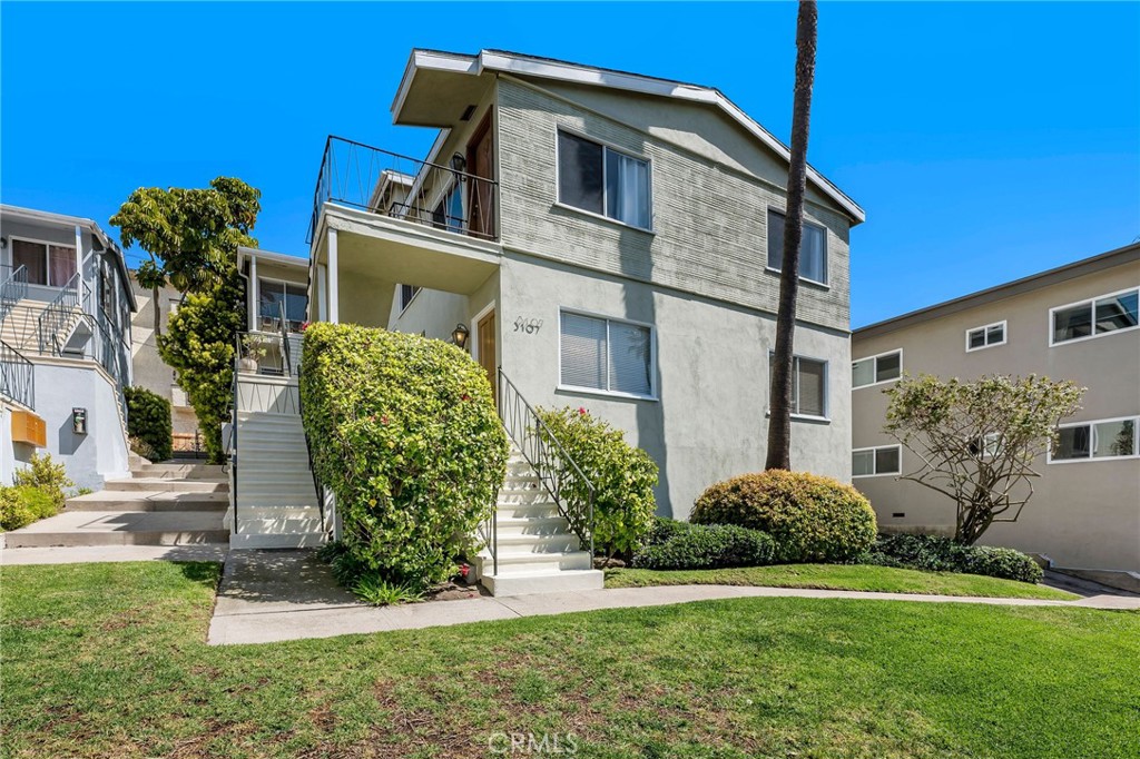 Unbelievable location! 3 short blocks from the beach, located in prime Ocean Park. Charming lower corner unit with west-facing views feature unique privacy. Large, picture windows greet you, showering the home with natural light, sea breezes and views of a beautiful peaceful garden, ocean views, and glorious sunset. New hardwood maple flooring, marble tiled bathroom, dramatic floor to ceiling hardwood wall-sized bookshelf. Great size bedroom complete with walk-in closet and peaceful garden and ocean views. Very low HOA dues of $150/mo. Side parking spaces (3 spots), along with permit street parking provide ample options for you and your guests. Lovely garden courtyard with tables and chairs to use throughout the day in an unbeatable Santa Monica location. Conveniently located near Main Street and Rose Ave, shops & restaurants to enjoy. Go on a neighborhood walk or to the beach.