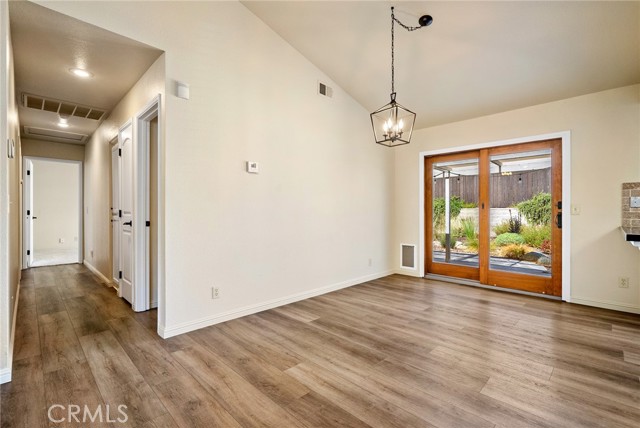 Attractive newer luxury vinyl plank flooring extends throughout most of the home.