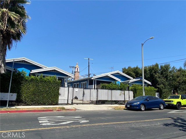 1402 N Las Palmas Avenue Los Angeles, California Extraordinary cute bungalows (separate units and duplexes) in a unique garden setting. 10 units total in the heart of high rent-demand Hollywood. Each separately metered. Great commuter location and a short walk to Hollywood and Vine Metro Station. Walking distance to restaurants and local nightlife. Secured perimeter gate helps make grounds safe for children’s play. Quiet street. Pleasant neighborhood. Please do not disturb tenants. Shown on accepted offers only. Can be purchased individually or as part of a seven-property portfolio (see attached Offering Memoranda for this individual property and the portfolio of seven properties).