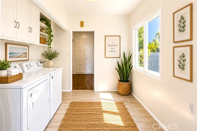 The Laundry could be Relocated out to the Oversized Garage in order to make a Larger Dining or Storage Area in the Kitchen. The Wall could also be Opened Up to the Living Room to Create a Great Room. Virtually Staged