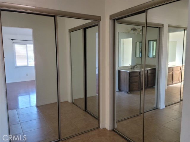 MASTER BEDROOM MIRRORED CLOSETS