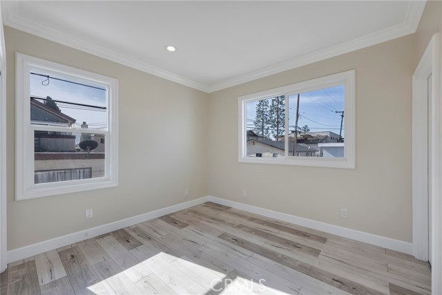 Second secondary bedroom has recessed lights.