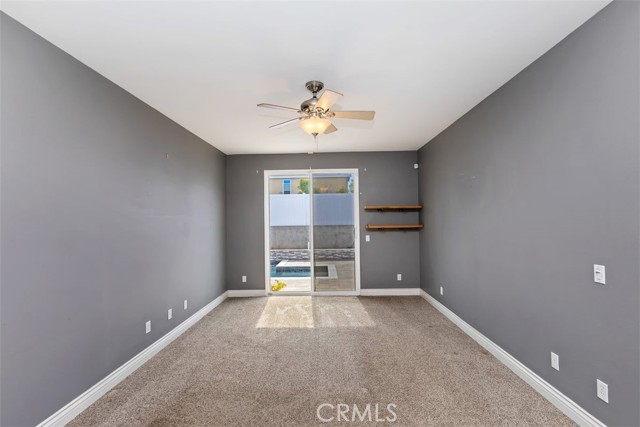 Primary Bedroom with Sliding Door to Backyard