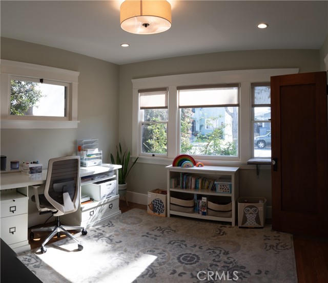 Downstairs front bedroom with lots of natural light.