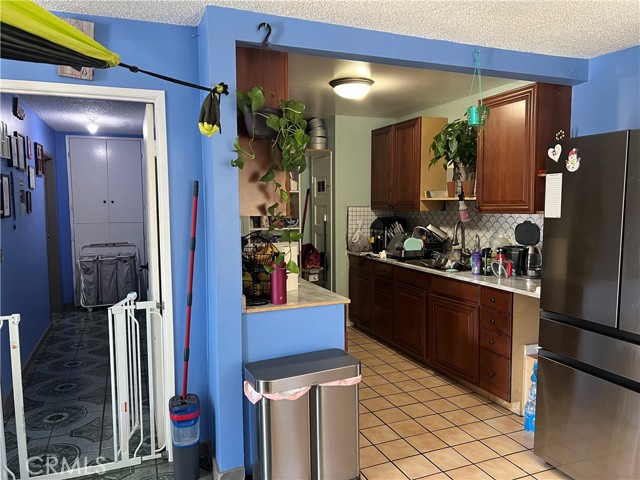9122 S Hoover Street, Los Angeles CA: https://media.crmls.org/medias/7158e038-9778-43af-b8c3-0abd205cbd16.jpg