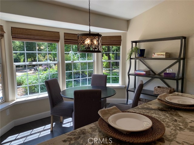 Granite Eating Bar off Kitchen View of Backyard